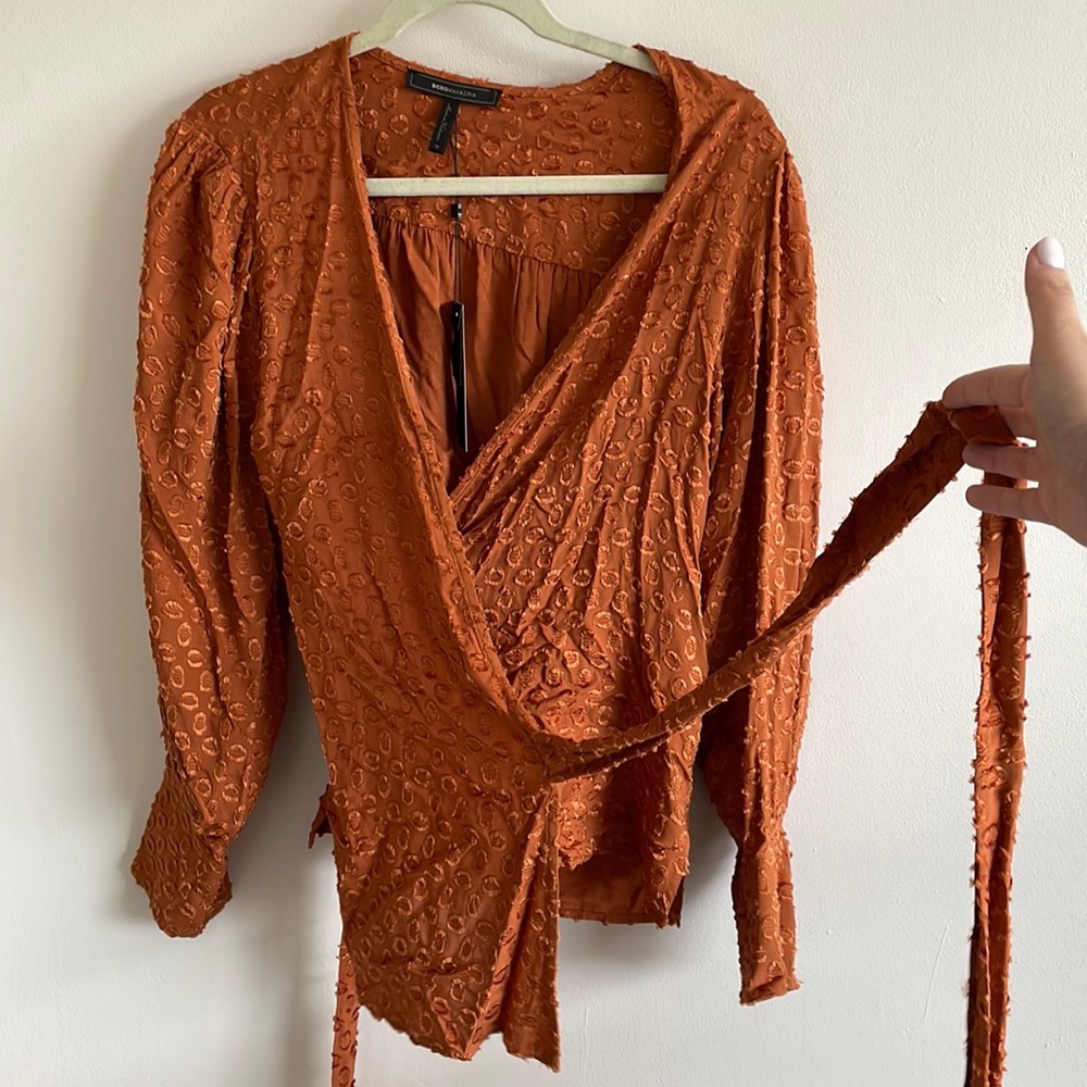 BCBGMAXAZRIA rust wrap blouse